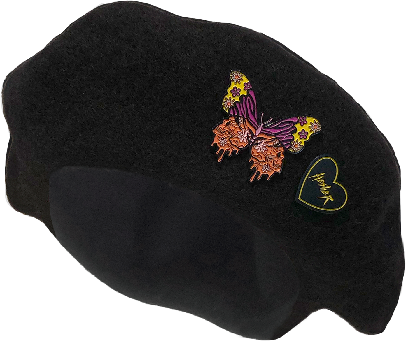 black wool beret with colorful butterfly metal pin and black and yellow Hesher heart shaped metal pin
