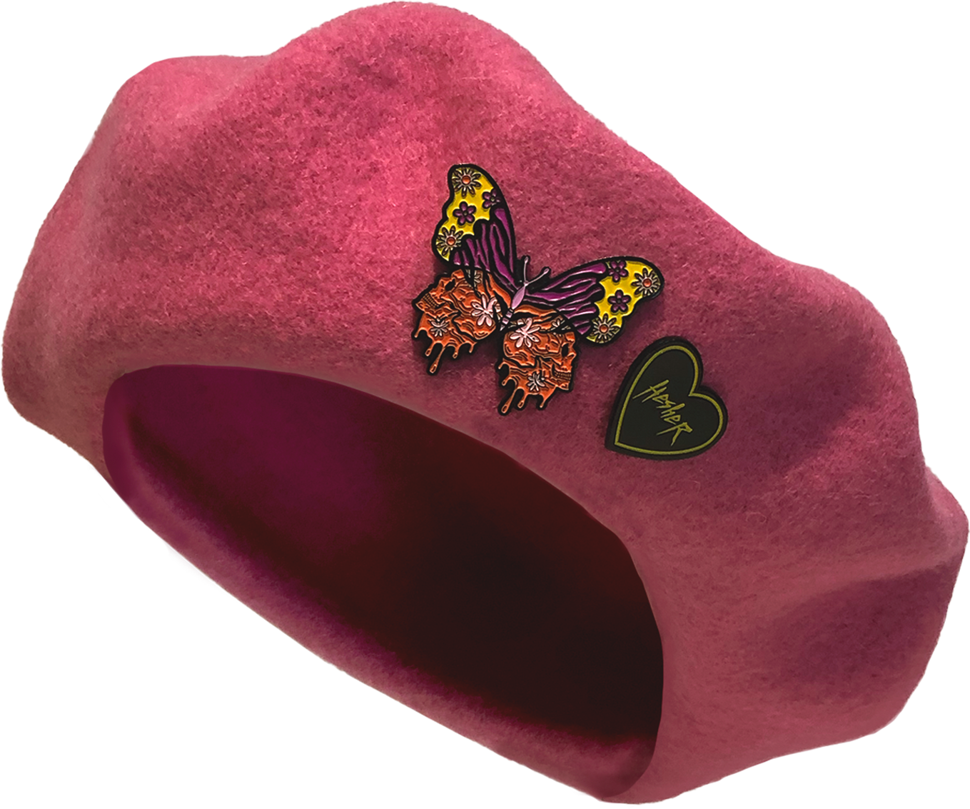pink wool beret with colorful butterfly metal pin and black and yellow Hesher heart shaped metal pin