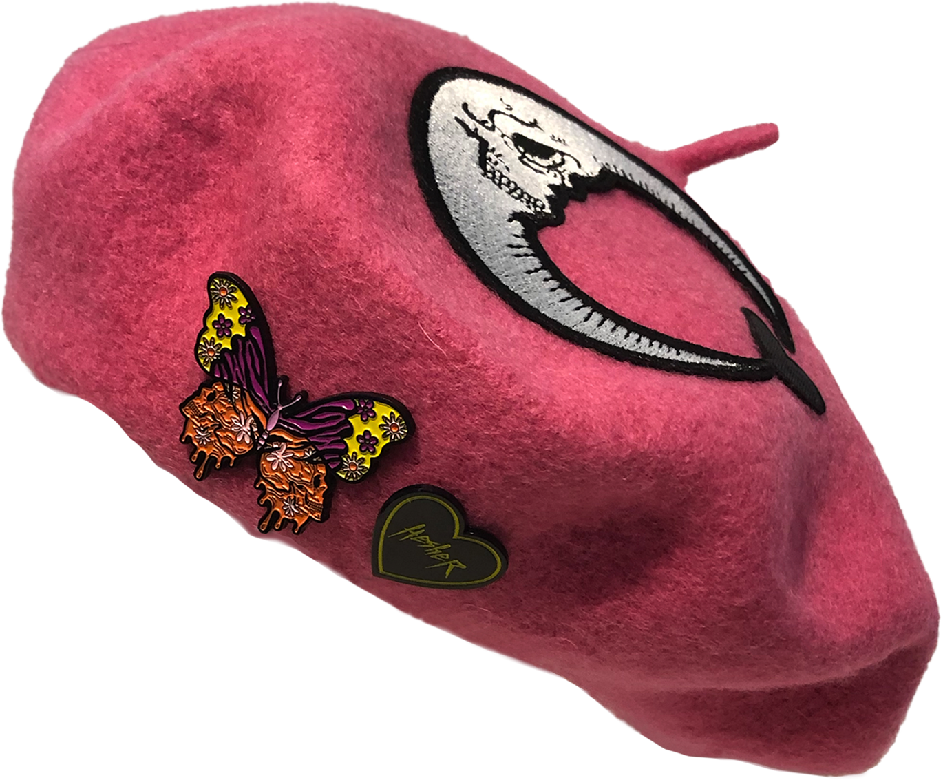 pink wool beret with skull moon heart patch and colorful butterfly metal pin and black and yellow Hesher heart shaped metal pin