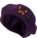 purple wool beret with colorful butterfly metal pin and black and yellow Hesher heart shaped metal pin